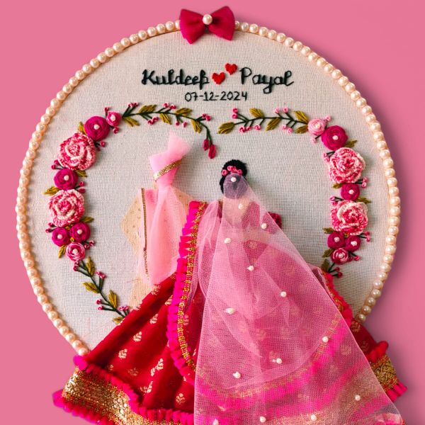  Embroidered hoop with double floral work